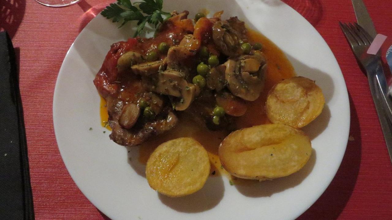 Plato en la Taberna Flamenca El Cortijo